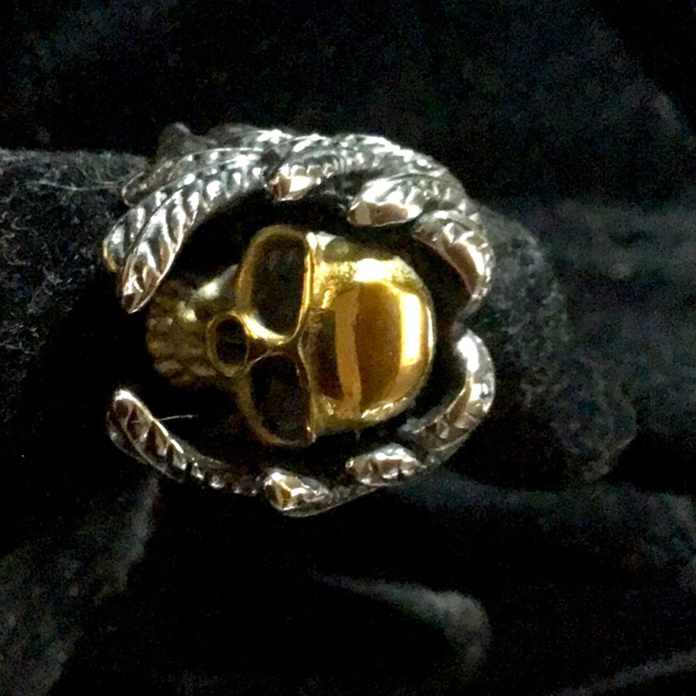 Masculine size almost 10 stainless steel man ring.  Beautifully crafted.
